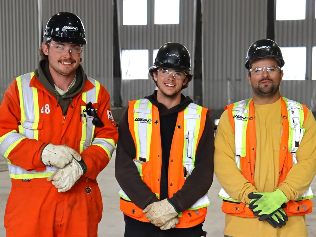 WSN Construction - Three Smiling Employees